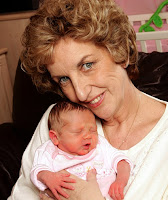 Older mother - Susan Tollefsen, from Essex, with her first child, daughter Freya who she had at the age of 57 at a Moscow clinic