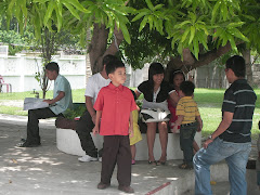 My son, Angel II (red polo shirt), curiously watching...