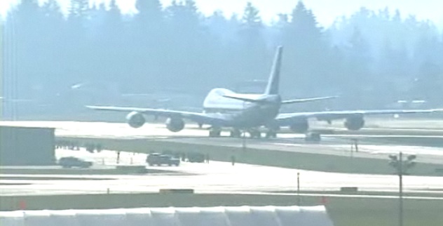 a large airplane on a runway