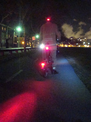 three tail lights on a Brompton