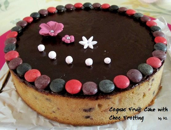 the batter baker Cognac Fruit Cake with Chocolate Frosting