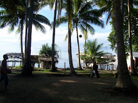 a game of volleyball before heading off to the main island