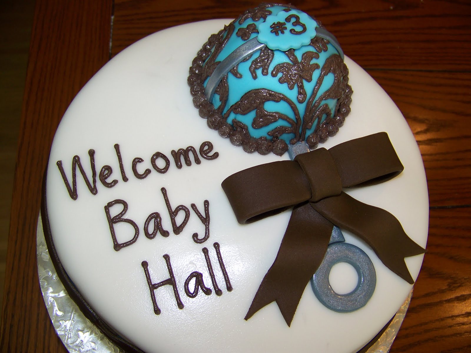 Plumeria Cake Studio Fancy Baby Rattle Cake