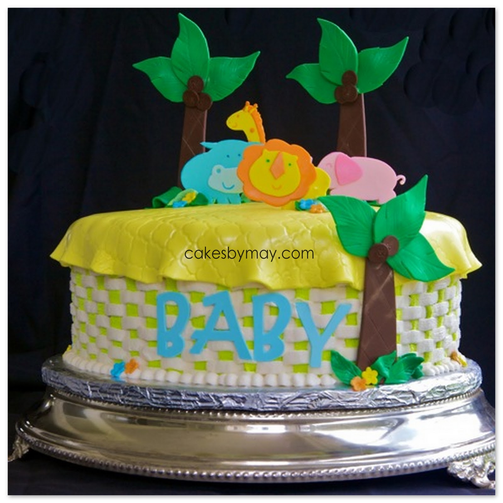 Zoo animals was the theme for Katie Johnson's Baby Shower. The cake ...