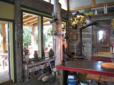 Interior of a cabin with natural light and large tables