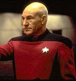 Patrick Stewart as Enterprise captain Jean Luc Picard in his red and black uniform