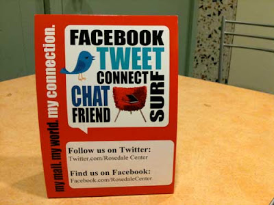 Table tent on a table with Tweet Chat Surf Connect and bird graphics