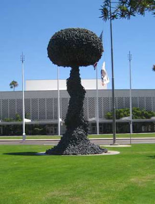 Black mushroom-shaped cloud sculpture