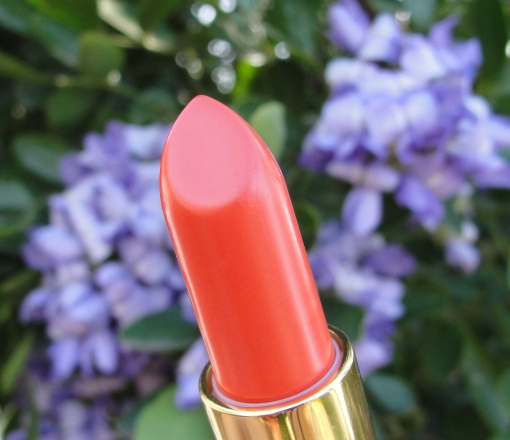 revlon coral berry lipstick. No, I am not affiliate with or getting paid by folks at Revlon but it certainly would be nice if they would send me a few dozen lip glosses to try out.