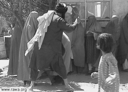 [090513-taliban-beating-women-in-public1.jpg]
