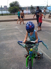 Ethan reads on his bike!