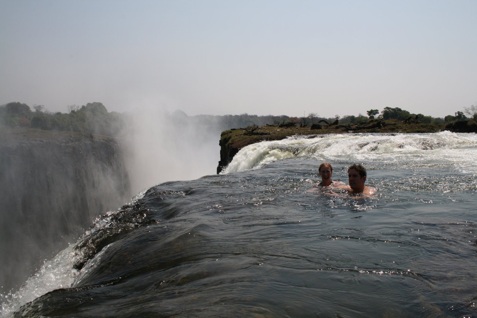[Tourists_swimming_at_Victoria_Falls.jpg]