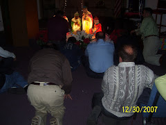Praying in 2008 as the clock strikes mid-night