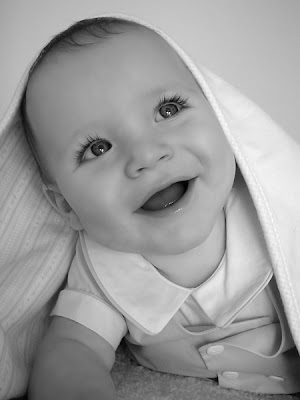 Smiling baby black and white photo