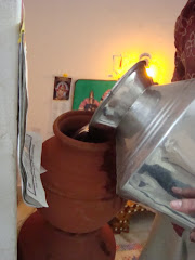 Pour Water into the pot on the top