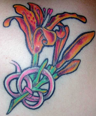 Fairy tattoo design with a lily flower incorporated.
