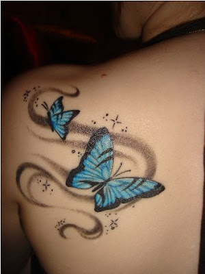 Small and sweet butterfly tattoo symbolizes delicate beauty