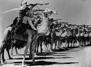CamelCorpsoftheArabLegionpracticesfiringfromcamelbackduringWorldWarII-1940s.jpg (640×472)