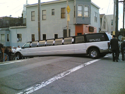 photo of a limo beached on a hill