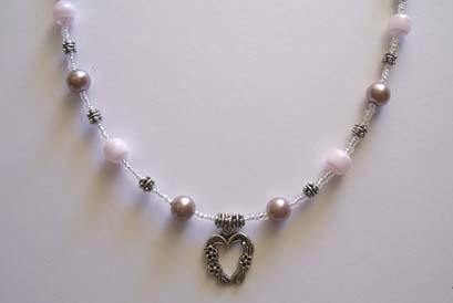 Heart Pendant & Purple Pearl Necklace (close-up)