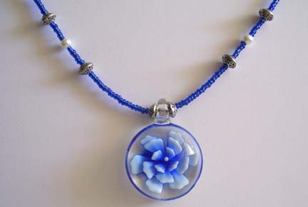 Blue Glass Flower Pendant Necklace (close-up)