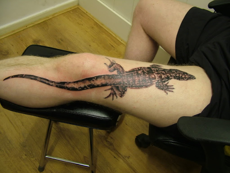 monitor lizard tattoo art on foot body title=
