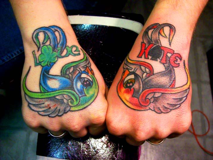 hand tattoo designs. Bird tattoo on hand