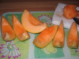 homegrown melon, sliced and ready for eating