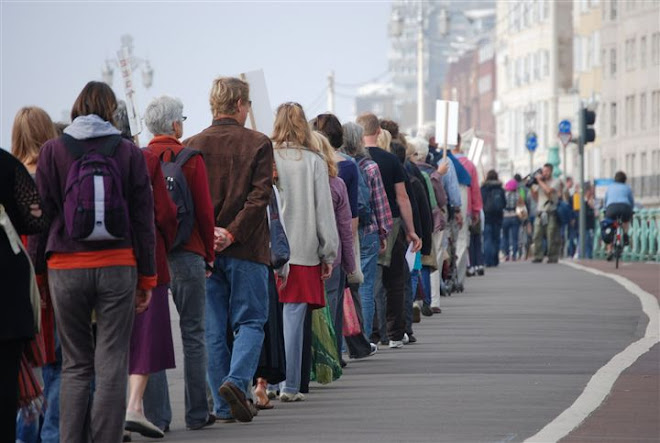 SLOWLY SILENTLY WALKING BEARING WITNESS FOR THOSE SUFFERING IN BURMA.