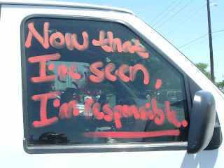We stopped in Waco at Baylor U to join up with the Waco/Baylor caravan and I spotted this white van in the parking lot with the phrase ''Now that I've seen, I'm _responsible_'' painted on the front passenger side window
