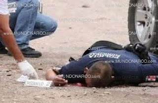 Hallan cuerpo de policia ejecutado Hallan cuerpo de policia ejecutado