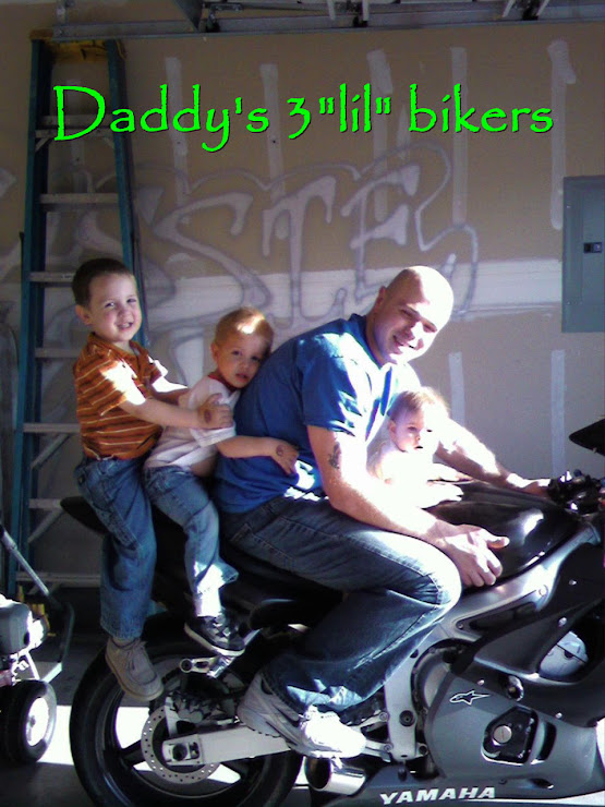 All the kids on dad's bike