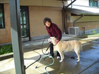 Baecky Sintek of the Sandy Kiwanis Club, with retired guide Hector