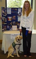 Puppy sitter Sklyer Nelson with Guide Dog puppy Dominic
