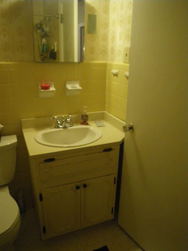 Yikes! We had the toothbrush holder and soap holder tiles taken down title=