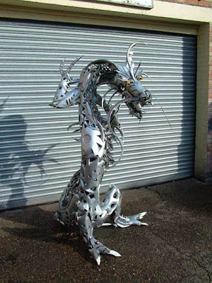 http://2.bp.blogspot.com/_mmBw3uzPnJI/SQGtos7ki8I/AAAAAAAAU7k/gCDrqQLhDLE/s400/Auto_Rims_Sculptures_06.jpg
