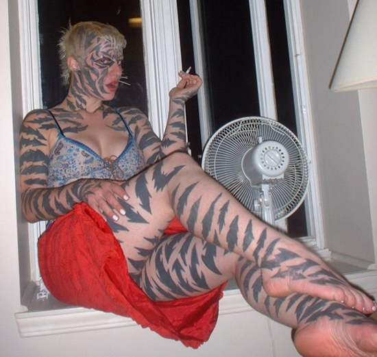 Most tiger tattoo designs are of the head of the tiger and why not,