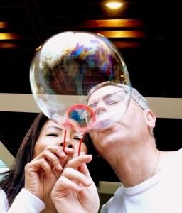 [1951782-Steve-and-Dow-blowing-bubbles-0.jpg]