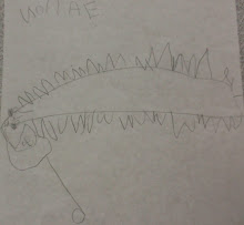 "A snake eating a rat, with rat pieces sticking out"