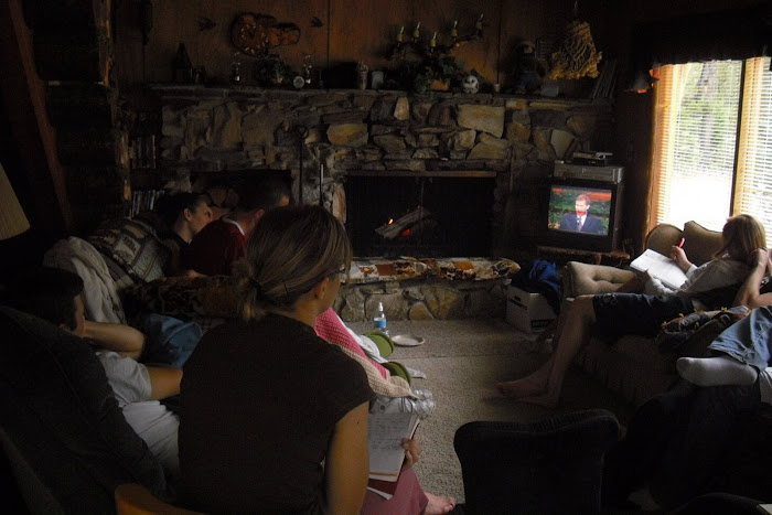 Watching Conference in the cozy cabin
