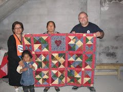 Giving quilts to the needy