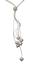 detalle collar concha y perlas cultivadas
