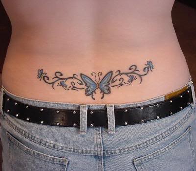 A tattoo of a cute butterfly one on the lower back region