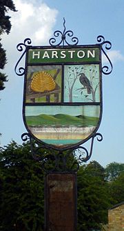 [180px-Harston_village_sign.jpg]