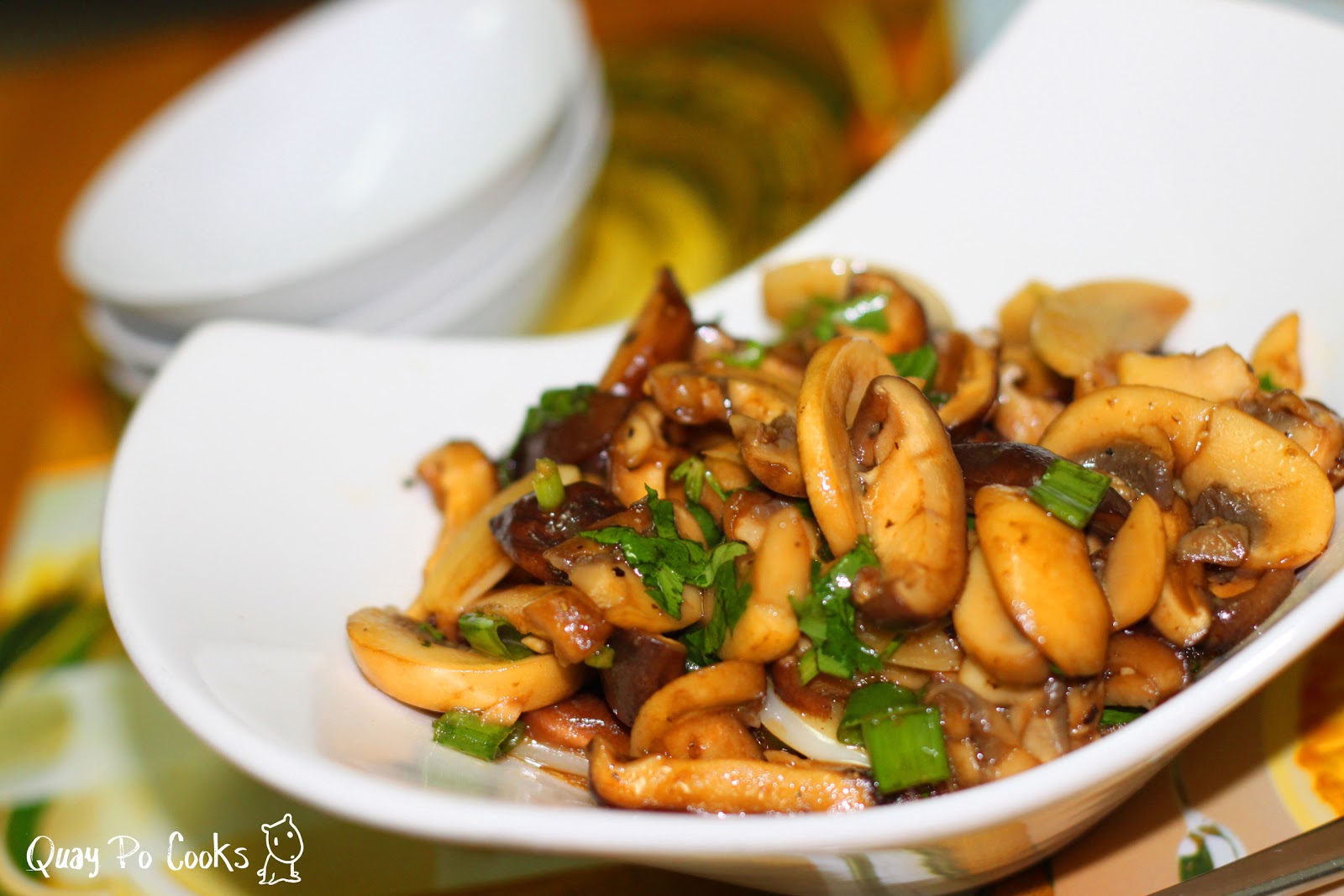 Quay Po Cooks Stir fry mushrooms in butter, garlic and white wine