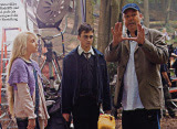 Evanna Lynch, Daniel Radcliffe, and David Yates on the set of OotP