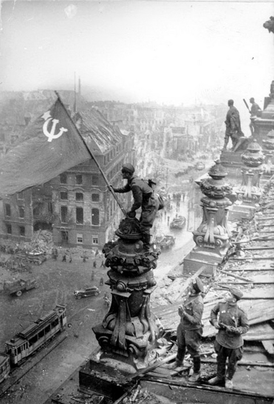 BERLIN. 1945 Soldiers%2Braising%2Bthe%2Bflag%2Bof%2BSoviet%2BUnion%2Bon%2Bthe%2Broof%2Bof%2BReichstag%2Bbuilding%2Bin%2BBerlin,%2BGermany%2Bin%2BMay,%2B1945