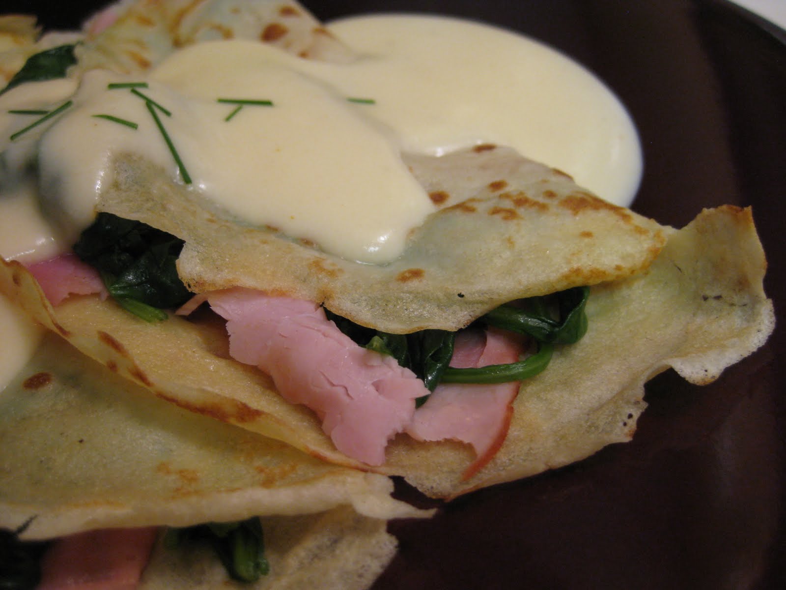 food for scot Ham and Spinach Crepes with Swiss Cheese Sauce