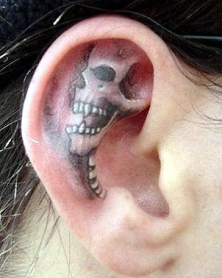 You are here: Home » Skull Ear Tattoo Design for 2011 ear-skull-tattoo