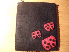 Portamonedas con mariquitas